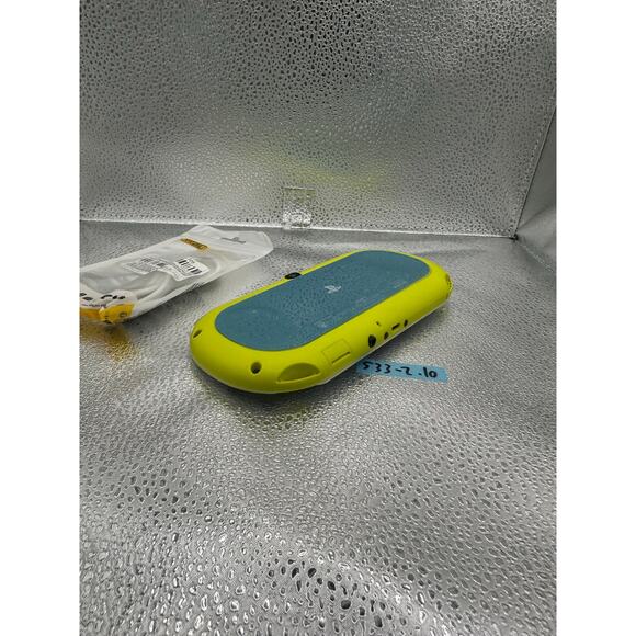white/yellow with a dash of light blue ps vita 2000 w/charger - Picture 7 of 8